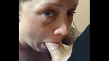 Kimberly is sucking her cock.