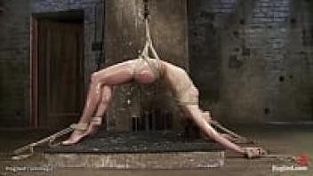 Back arch bondage candle waxed by a slave in back arch