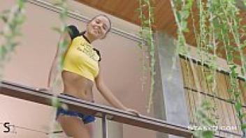 For the camera, Katya Clover struts her little figure.