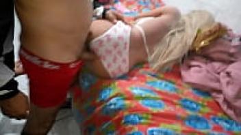 I firmly insert it from the side into the hottie's ass, going all the way in (sex toy).