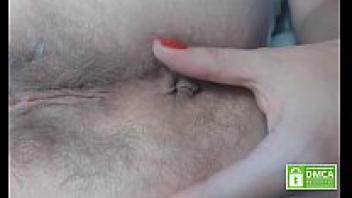 Extreme close-up of an extremely hairy asshole playing and fingering