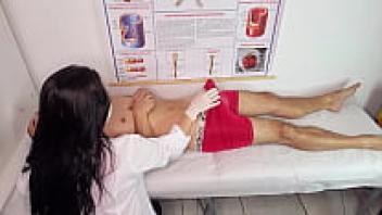 The nurse watches the patient's erection.