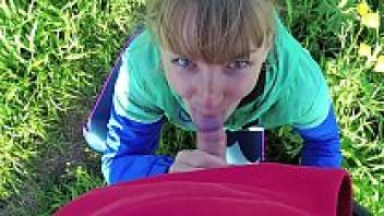 Cum in mouth and dangerous outdoor blowjob in the park. A couple of amateurs. Pov