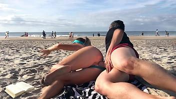 The last thing she expected while lying on a public beach was to get a dick in her ass in front of everyone.