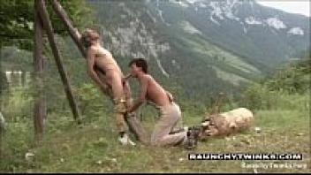 A couple having outdoor sex with horny twinks