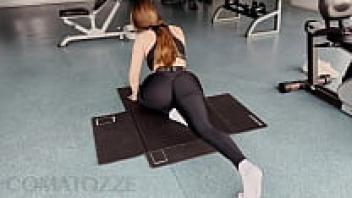 After working out in the gym, a big tit girl wearing tight leggings received a cream pie.