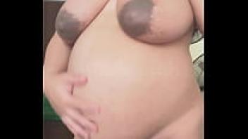 When she was at home by herself, the horny pregnant maid couldn't help but start flaunting her hairy pussy and big boobs on video.