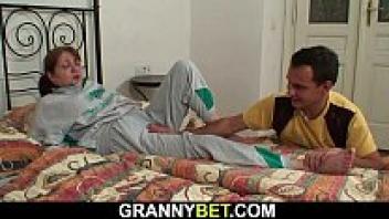 Grandma rides his little cock with an injured, hairy pussy.