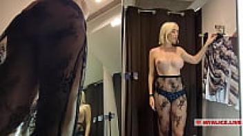 pussy upskirt view. Big-titted blonde trying on a bunch of outfits