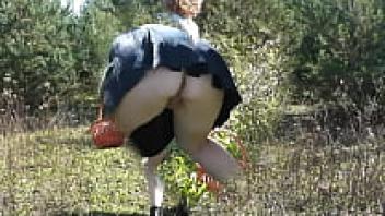 MILF gorgeous, attractive, blonde Frina forgot to wear underwear when picking in the forest. without underwear. No underwear upskirt. Publicly nude. Outside. Outside. Outside