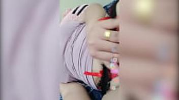 The girls display the large and white items.