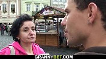 Granny Tourist's hairy pussy screwed on the ground
