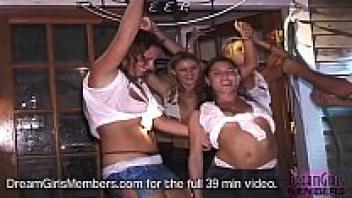 To win money, all-natural college girls rip off their shirts.