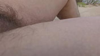 Mature and hairy on the beach