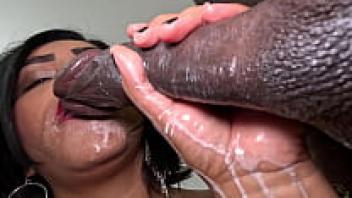 A large black man is opening my ass with chocolate and whipped cream.