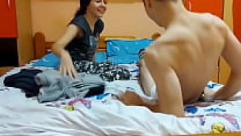 In the bedroom, a hot teen pair is enjoying rough, intense sex.