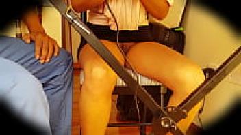 A Colombian university student wearing an upskirt is seen sans underwear.